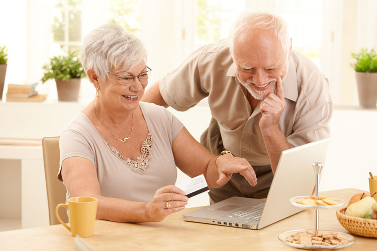 Elderly Couple on Computer